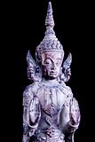Wooden crafted Indonesian god figurine close-up