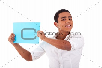 young latin man, with blue  card in hand, smiling, isolated on white background. Studio shot.