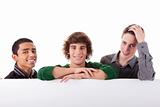 happy three young, of different colors man with a white board, isolated on a white background