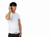 young guy speaking on cell phone