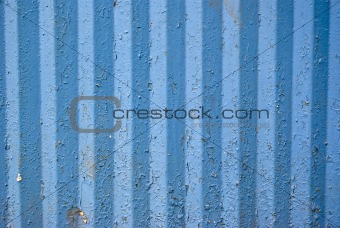 ribbed surface of the painted metal plate
