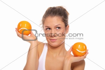 Woman with two oranges  different emotions isolated