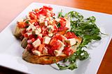 Bruschetta with tomatoes and cheese