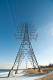 Electrical Transmission Tower (Electricity Pylon) beside a lake 