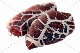 two pieces of half-finished tasty chilled meat product isolated 