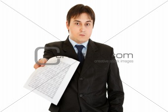 Surprised  modern businessman giving document
