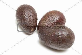 Three avocados isolated
