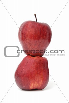 Two red apples isolated on white