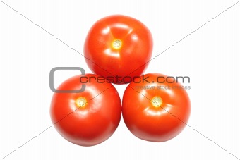 Three ripe tomatoes isolated on white