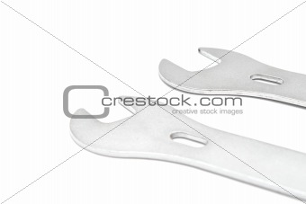 Two nut wrenches on white background