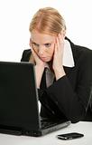 Stressful business woman working on laptop
