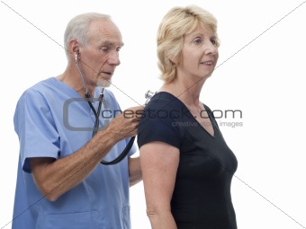 Male surgeon checking patient's heartbeat