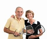 Active senior couple ready for racket sport