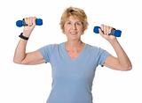 Active senior woman using hand weights