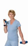 Active senior woman exercising with hand weights