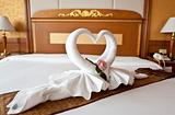Honeymoon Bed Suite decorated with flowers and towels