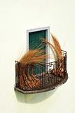 balcony at old house in Madeira with package of wicker