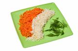 Grated carrots, celery and dill on a green square plate