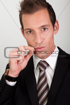 Businessman asking for silence