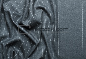 Pin striped suit with creases