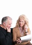 Older couple going over accounts