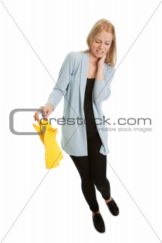 Frustrated woman in despair before cleaning