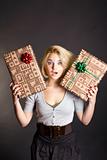 Surprised woman holding two gift box