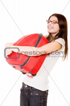 happy girl with suitcase on a white background 
