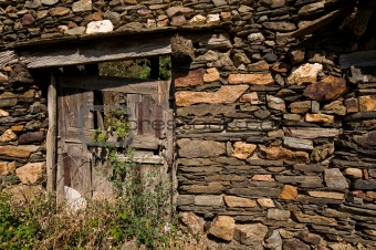 Aged wooden door in an ancient house