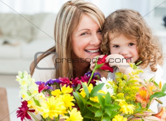 Young girl with her grandmother looking at the camera