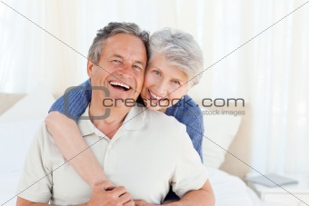 Senior couple looking at the camera