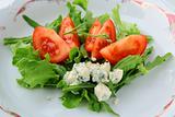 Salad with tomatoes and blue cheese