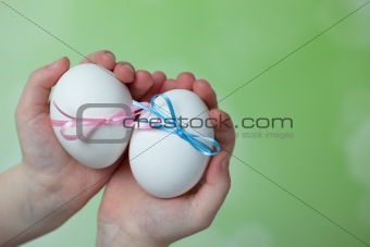 Children hands holding  Easter Eggs