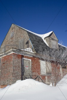 Abandoned house in winter