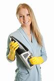 Cheerful woman with handheld vacuum cleaner