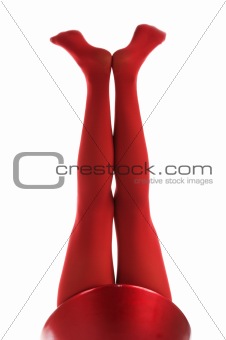 Female feet in red stockings