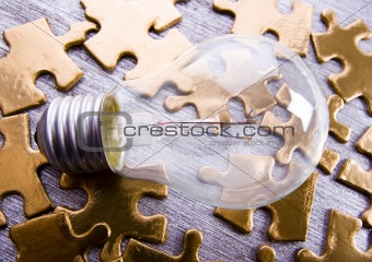 Light bulb on jigsaw