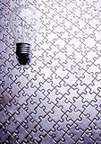 Light bulb on jigsaw