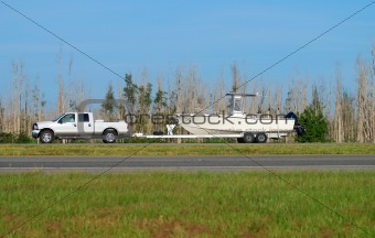 Pickup truck hauling boat
