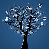 Tree over blue with snow crystals