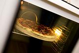Pizza Baking in Oven