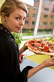 Young Woman with Fresh Pizza