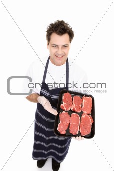 Butcher displaying some beef