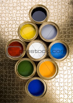 Paint and gold cans