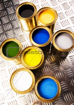 Paint and gold cans