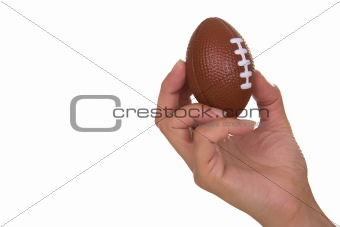 Hand holding rugby ball