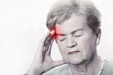 Elderly woman with a headache