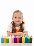 Little girl and her coloring kit