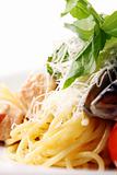 Spaghetti and meat with cheese basil and mussels