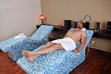 man relaxing at spa